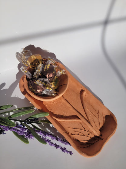 Handmade terracotta bowl made of clay, unglazed.