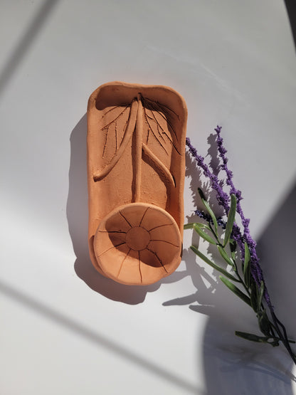 Handmade terracotta bowl made of clay, unglazed.