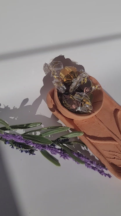 Handmade terracotta bowl made of clay, unglazed.